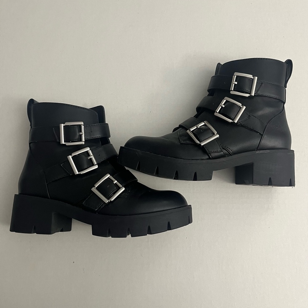 Sleek Black Moto Boots with Buckle Detail